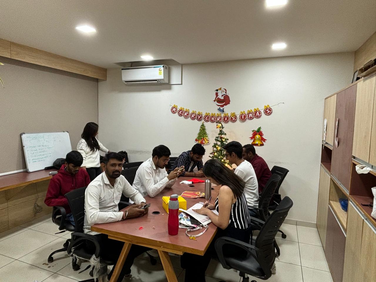 Rivaan Indian Pacific team celebrating together in the office